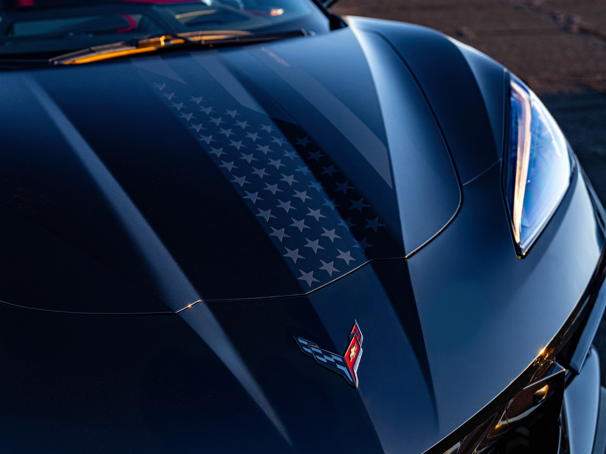 A Close-Up of the Hood of a Chevrolet Corvette Stingray with a Stars and Steel Pattern.