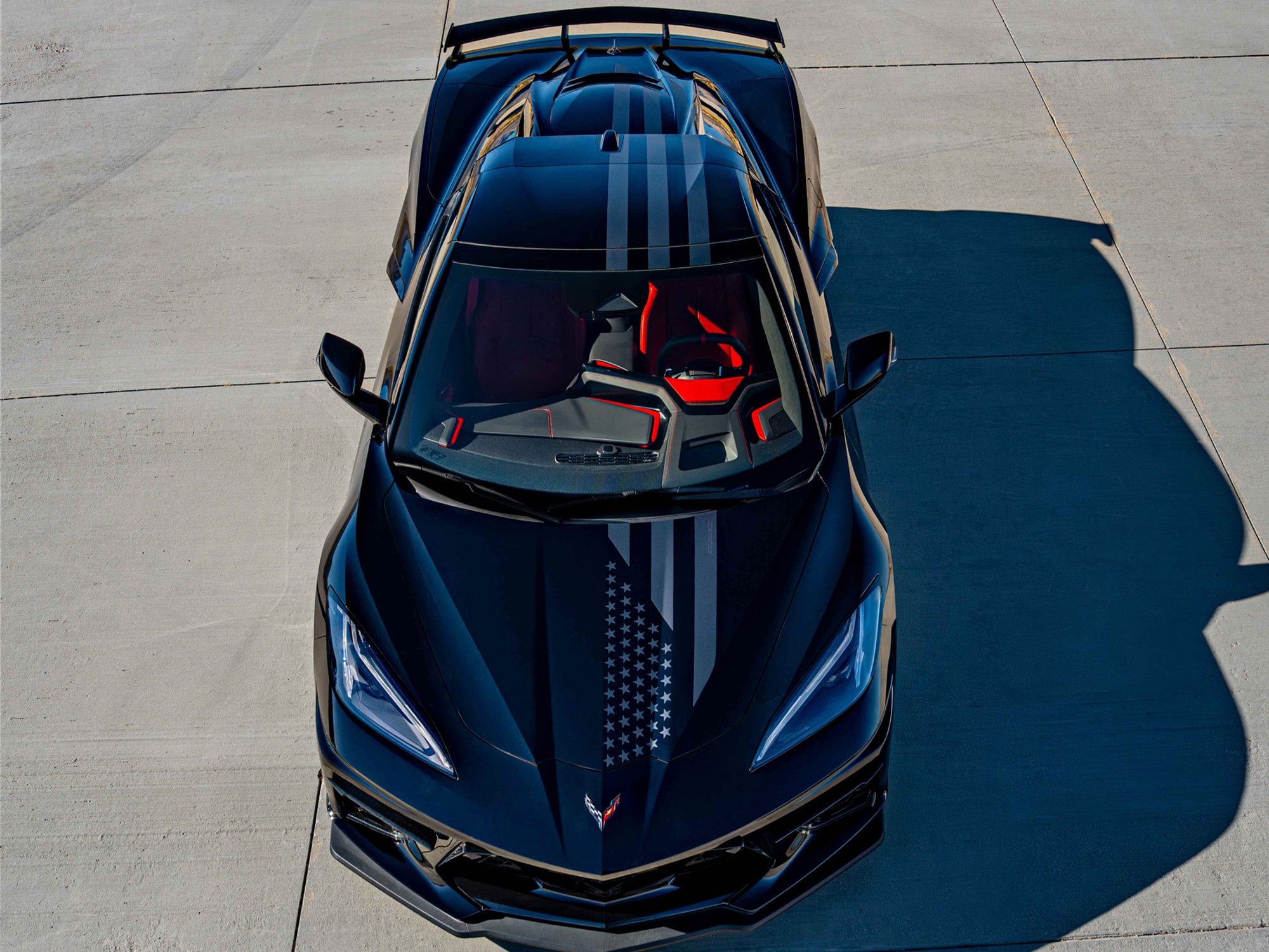 A Top-Down View of a Chevrolet Corvette Stingray Stars and Steel Edition with Racing Stripes.