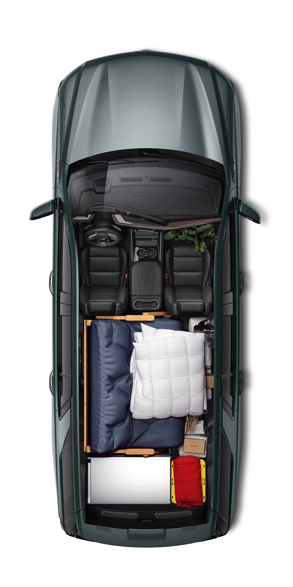 A Top View of the 2026 Chevy Tahoe Interior with Camping Materials Packed Up to the First Row